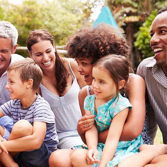 A community gathering of adults and children.