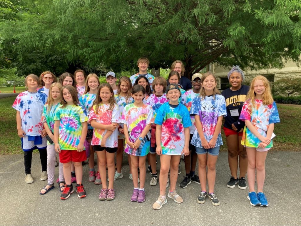 A group of campers at 4-H day camp pose for a photo