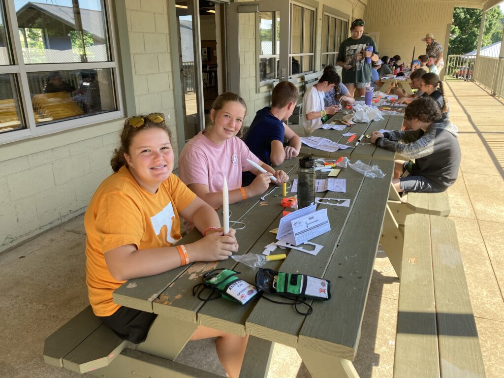 teens making bottle rockets